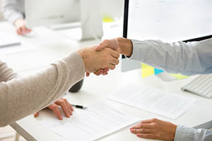 images/handshake-man-woman-after-signing-business-contract-closeup.jpg